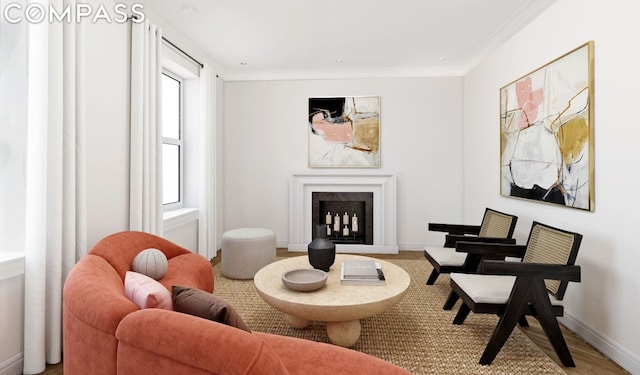 sitting room featuring crown molding and wood-type flooring