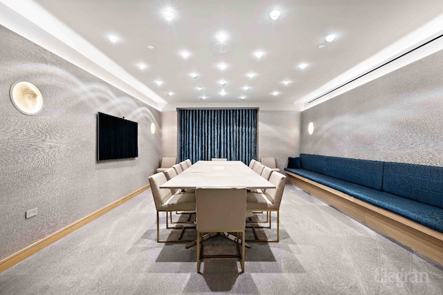 dining area featuring light colored carpet