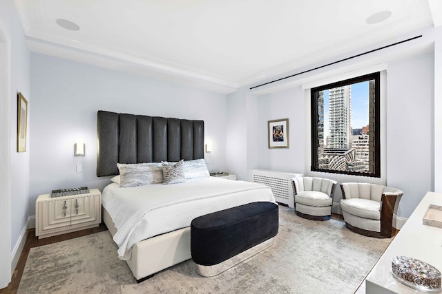 bedroom featuring hardwood / wood-style floors