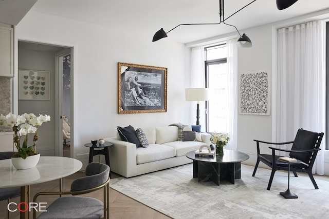 living room featuring light parquet flooring