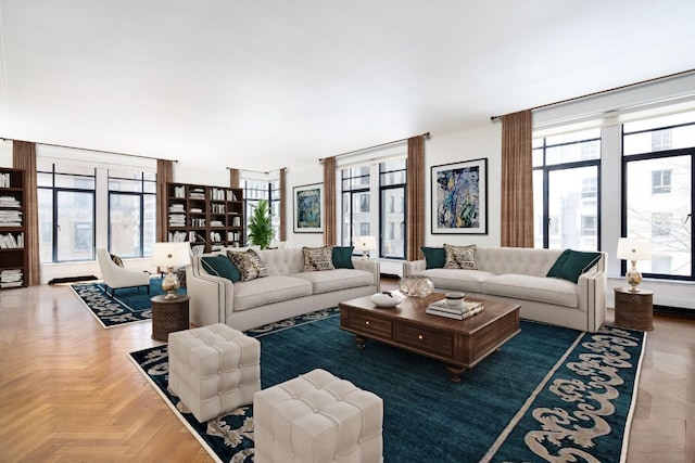 living room featuring parquet flooring