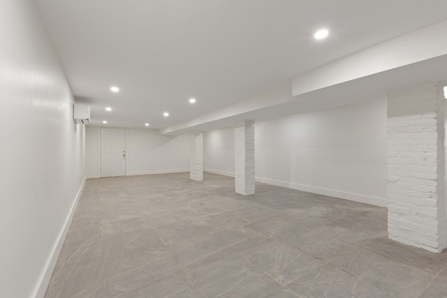 basement featuring a wall unit AC