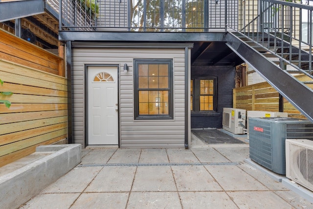 entrance to property featuring ac unit and central air condition unit