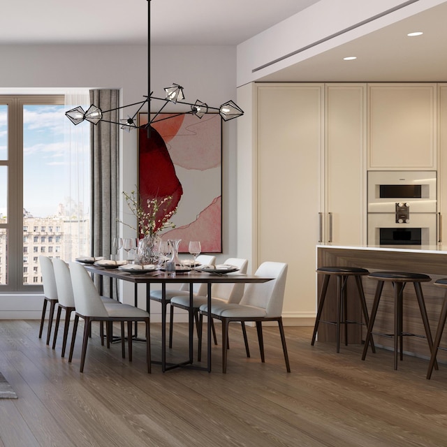 dining space with dark wood-style flooring and a chandelier