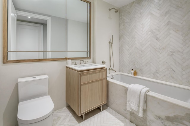 full bathroom with vanity, toilet, and washtub / shower combination