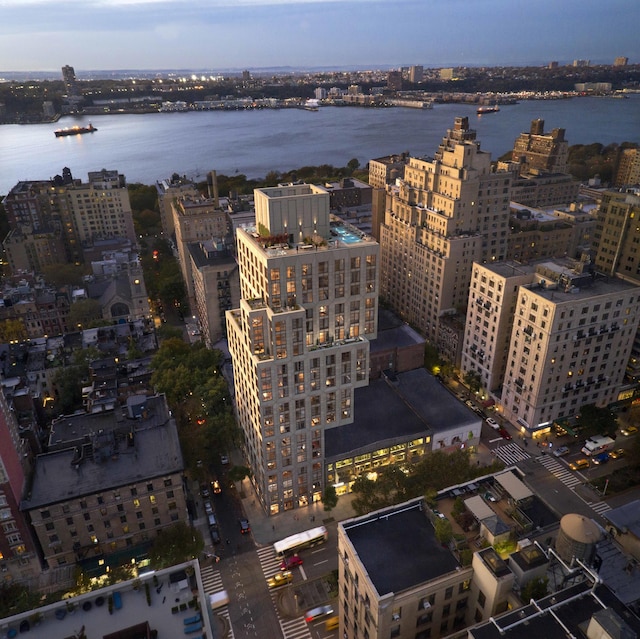 aerial view featuring a view of city and a water view