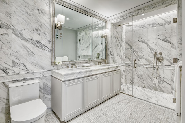 bathroom with a marble finish shower, toilet, tile walls, and a sink