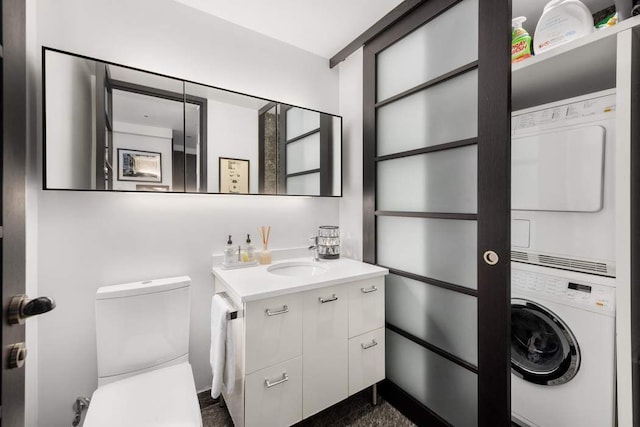 20 Pine St Unit 3001, New York City, NY 10005 - half bathroom with stacked washer / drying machine, toilet, and vanity