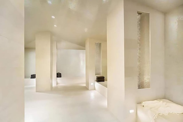20 Pine St Unit 3001, New York City, NY 10005 - corridor with lofted ceiling and concrete floors