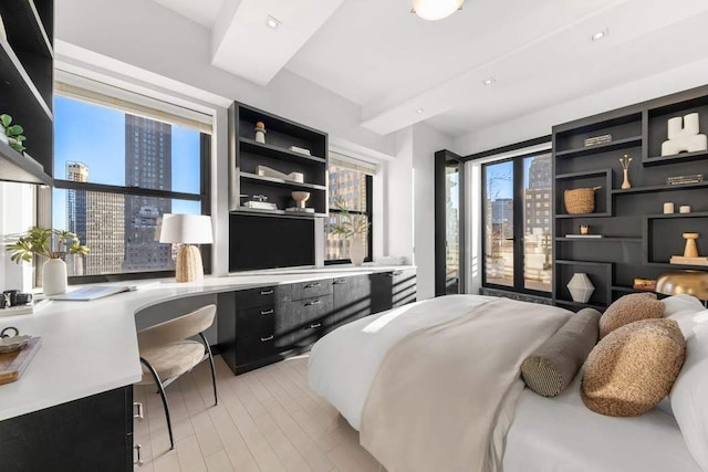 20 Pine St Unit 3001, New York City, NY 10005 - bedroom with light wood-type flooring and recessed lighting