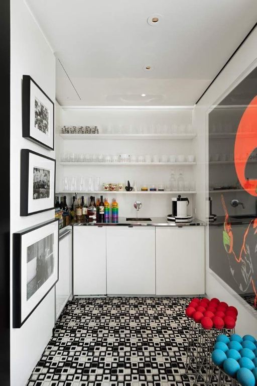 bar featuring oven and white cabinets