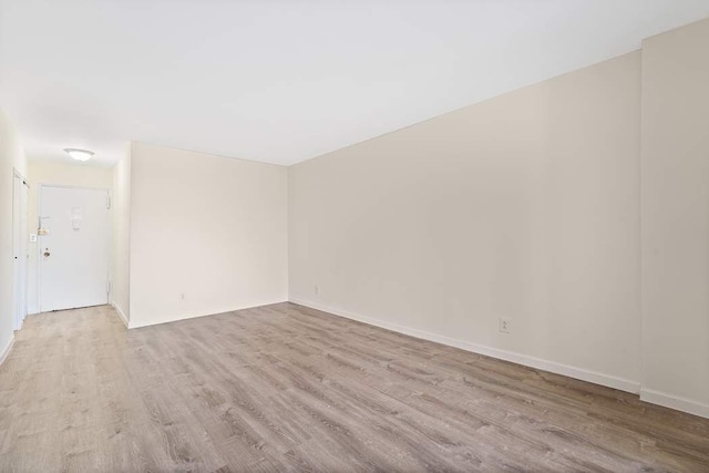 empty room featuring light hardwood / wood-style floors