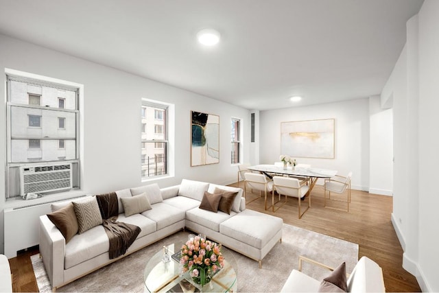 living room with light wood-type flooring and cooling unit