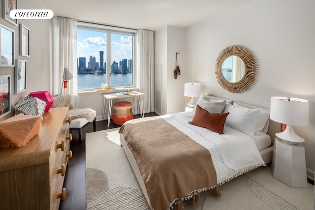 bedroom with a city view