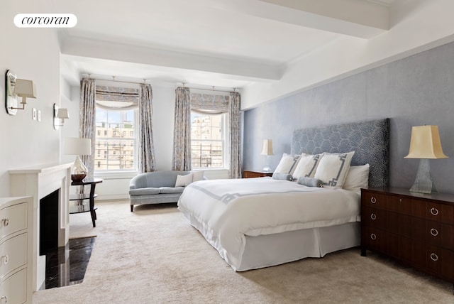 bedroom with light carpet, a fireplace with flush hearth, visible vents, and beam ceiling