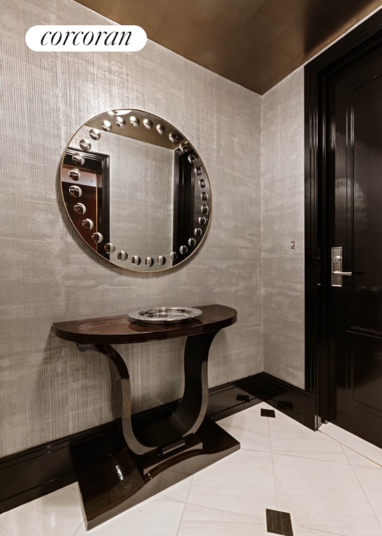 bathroom with tile patterned flooring