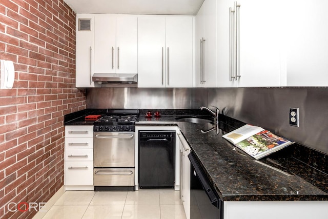 kitchen with white cabinetry, stainless steel gas range, dark stone counters, and black dishwasher