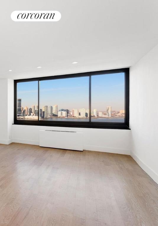 empty room featuring light hardwood / wood-style floors