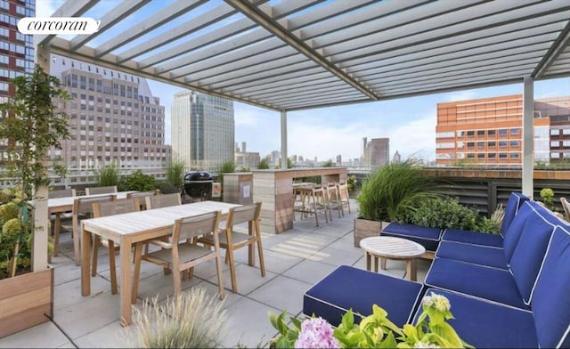 view of patio / terrace featuring outdoor dining area, a view of city, outdoor dry bar, and a pergola