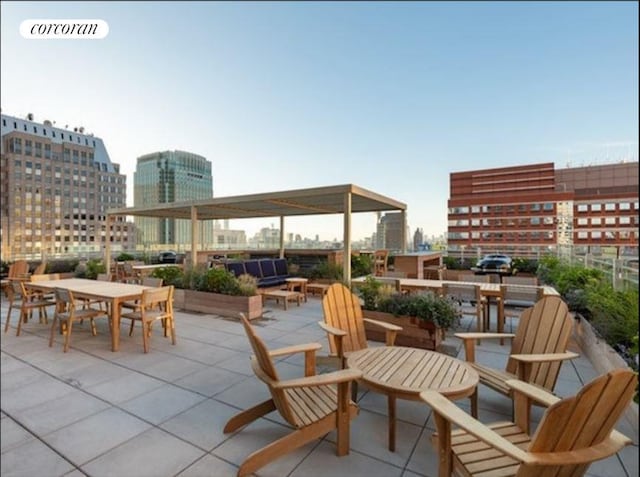 view of patio featuring a city view and visible vents