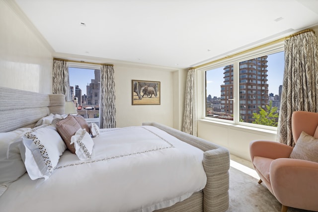 1049 5th Ave Unit 19B, New York City, NY 10028 - bedroom featuring a view of skyline