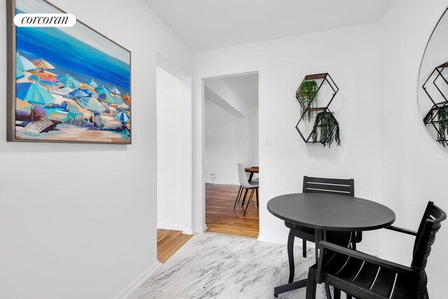 dining area with light wood-type flooring