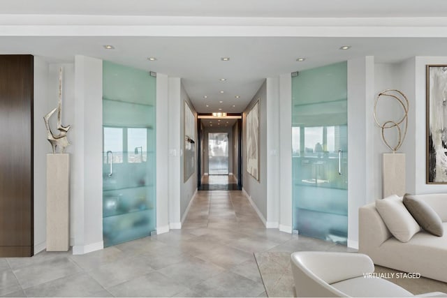 corridor featuring light tile patterned flooring