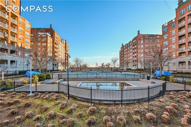 view of pool with fence