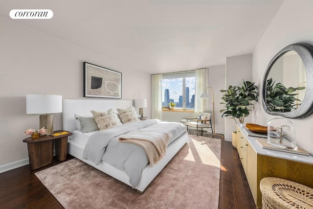 bedroom featuring dark hardwood / wood-style floors