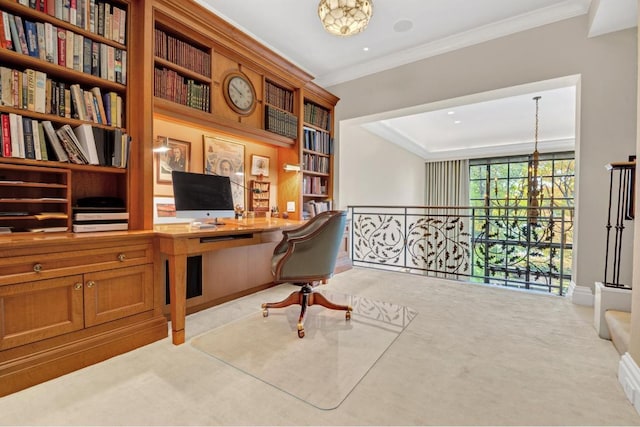 office area with crown molding, light carpet, built in desk, and a notable chandelier