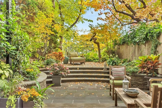 surrounding community with a patio area