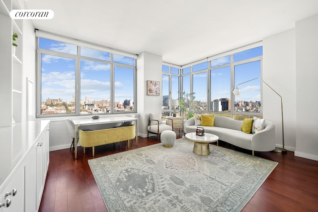 sunroom / solarium with a view of city and visible vents