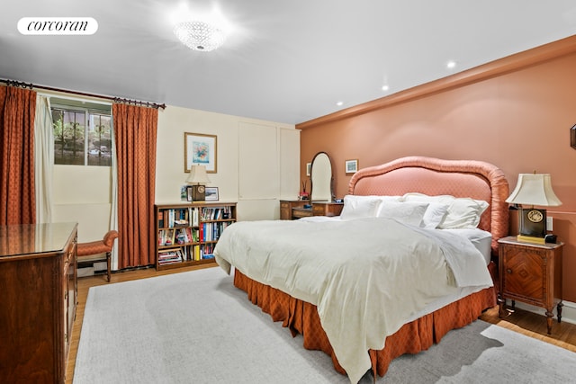 bedroom with light hardwood / wood-style flooring