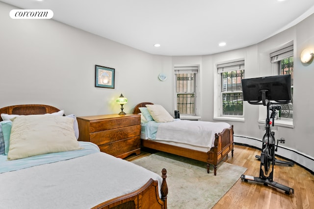 bedroom with light hardwood / wood-style floors