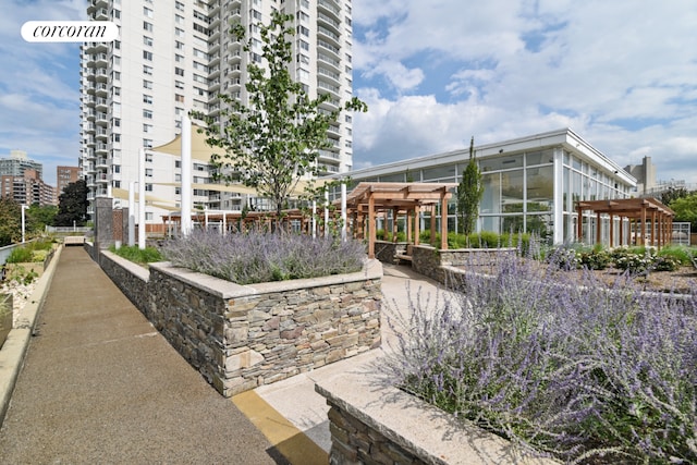 view of property's community with a pergola