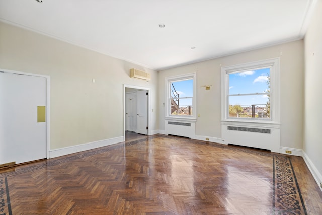 interior space with radiator, dark parquet floors, and a wall mounted AC