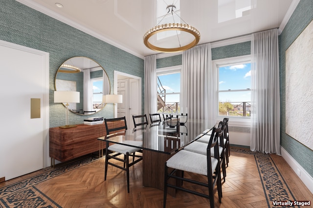 dining space featuring baseboards, crown molding, and wallpapered walls