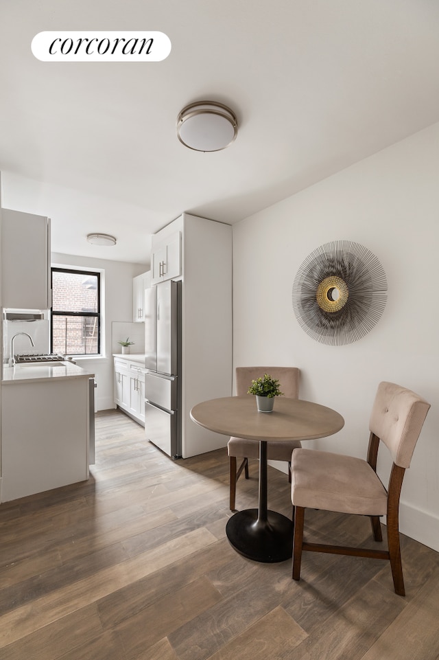 2420 Morris Ave Unit 2K, New York City, NY 10468 - dining area featuring light wood-style floors