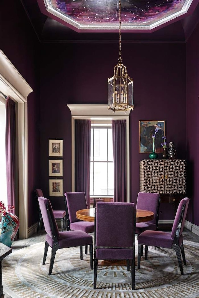 dining room featuring an inviting chandelier and carpet flooring