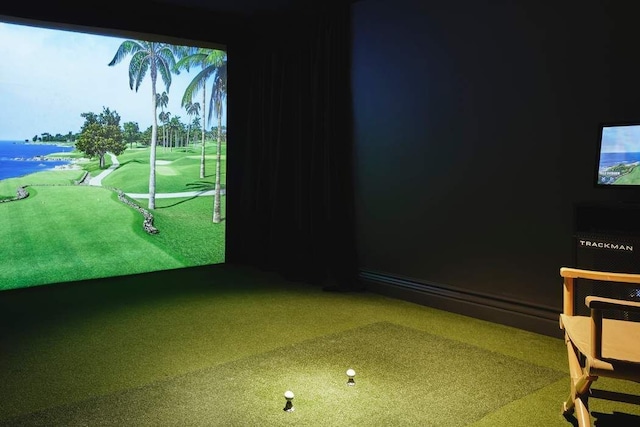 recreation room featuring carpet floors and golf simulator