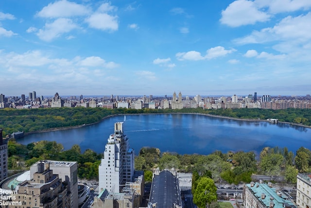 view of urban area featuring a large body of water