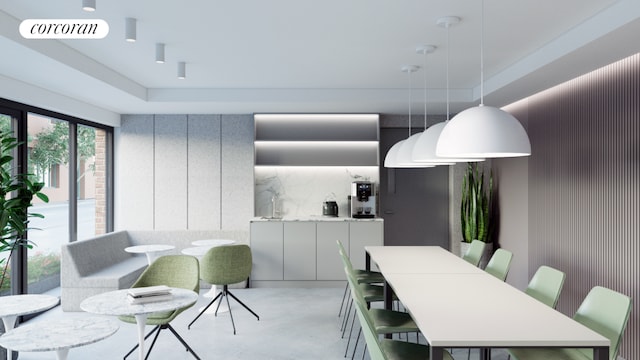 dining room with a tray ceiling