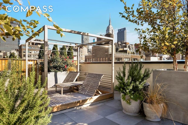 view of patio with a city view