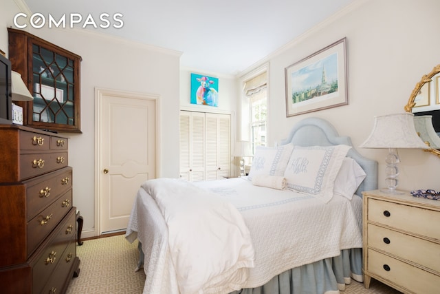 bedroom featuring a closet and ornamental molding