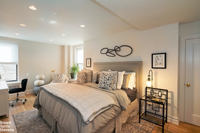 bedroom with light hardwood / wood-style floors