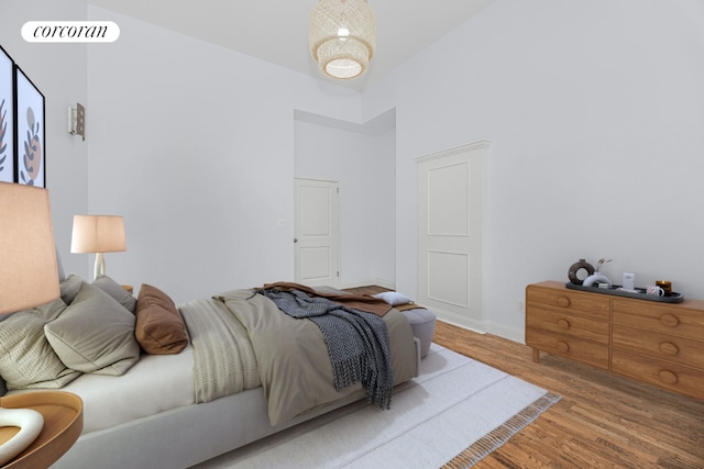 bedroom featuring wood-type flooring