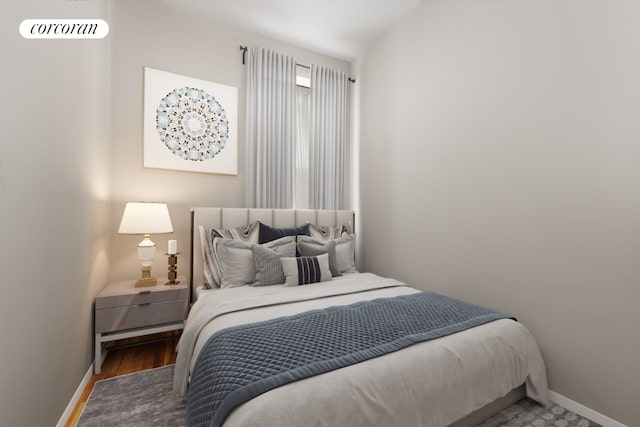 bedroom with wood-type flooring