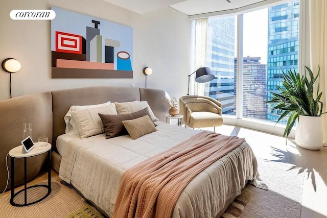 bedroom with floor to ceiling windows