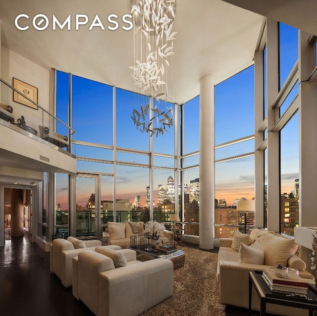 sunroom featuring a chandelier