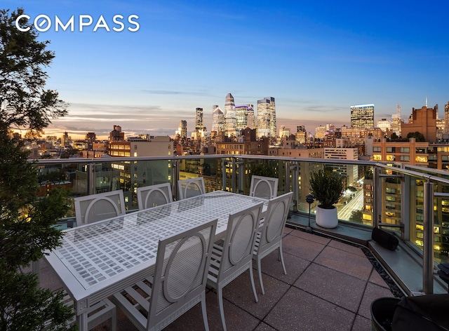 balcony featuring a city view